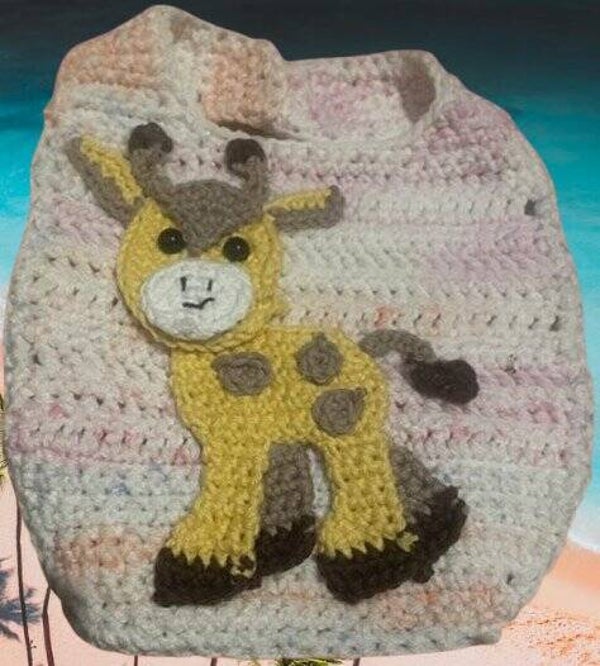 118. Crocheted Giraffe Bib