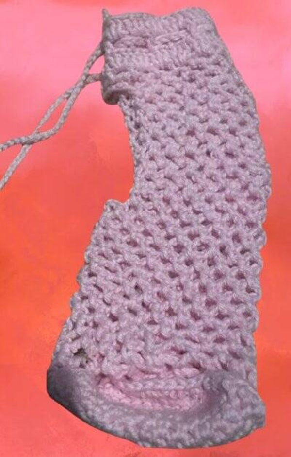123. Crocheted Pink Bottle Holder