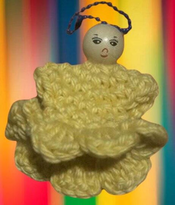 29. Crocheted Yellow Girl Keychain