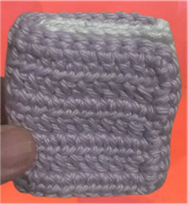 36. Crocheted Book Keychain