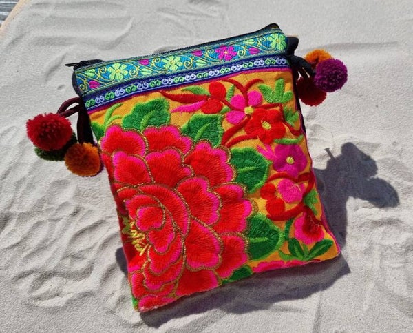 Tasje met oranje bloemen en lang hengsel