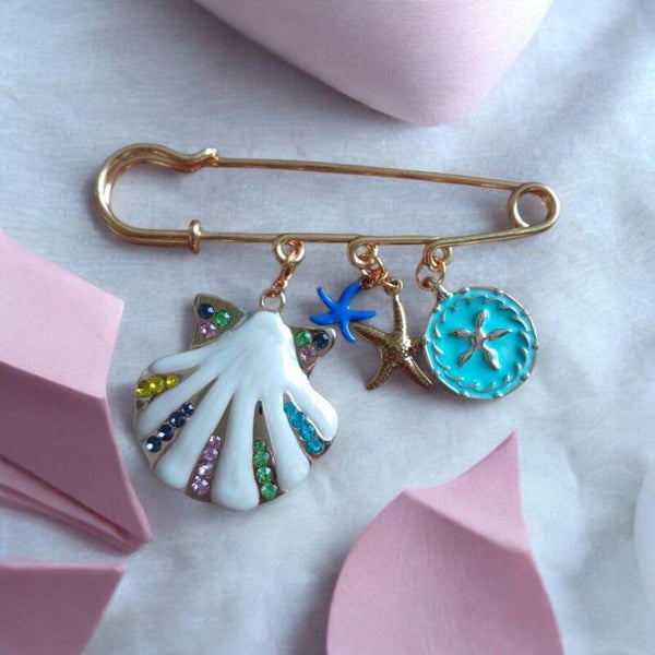 Strand Broche