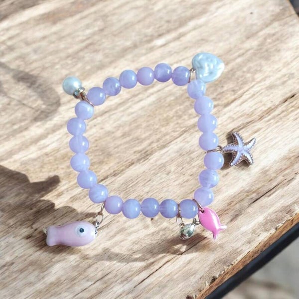 Beache armbandje roze visjes