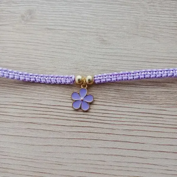 Bracelet réglable à breloque émaillée (fleur/papillon)