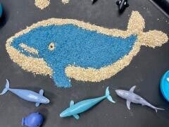 Toddlers enjoying sensory play at Doodlebugs Minibugs group
