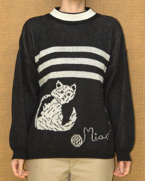 Zwart/zilveren trui met licht verfomfaaide kat