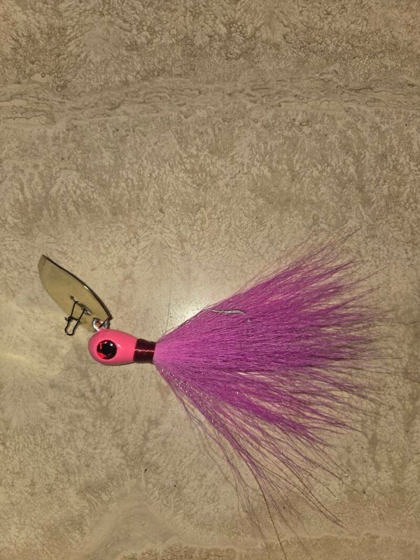 Joe's swivel head, striper, bucktail jigs. 3/4 oz. Flamingo flash.