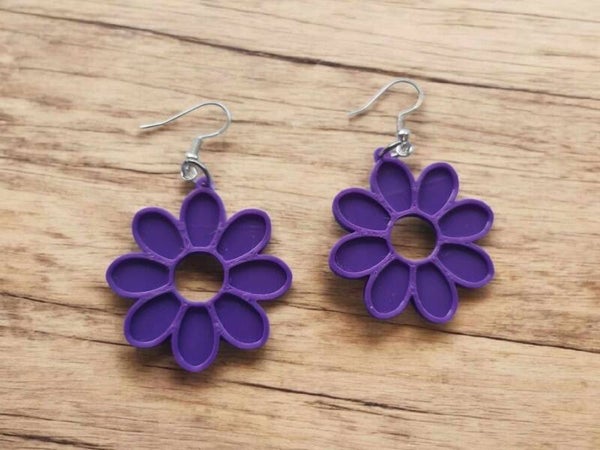 3D Printed Purple Flowers with a hole in the centre
