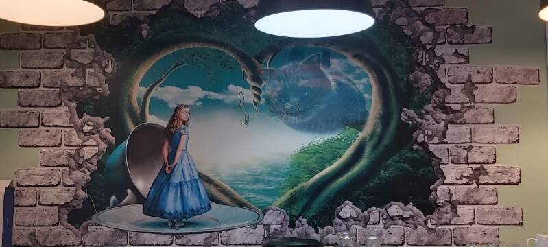 alice in wonderland en de kolderkat