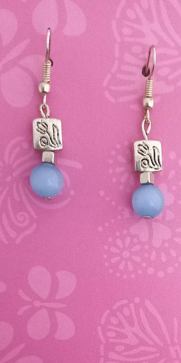 Boucle d'oreille 1