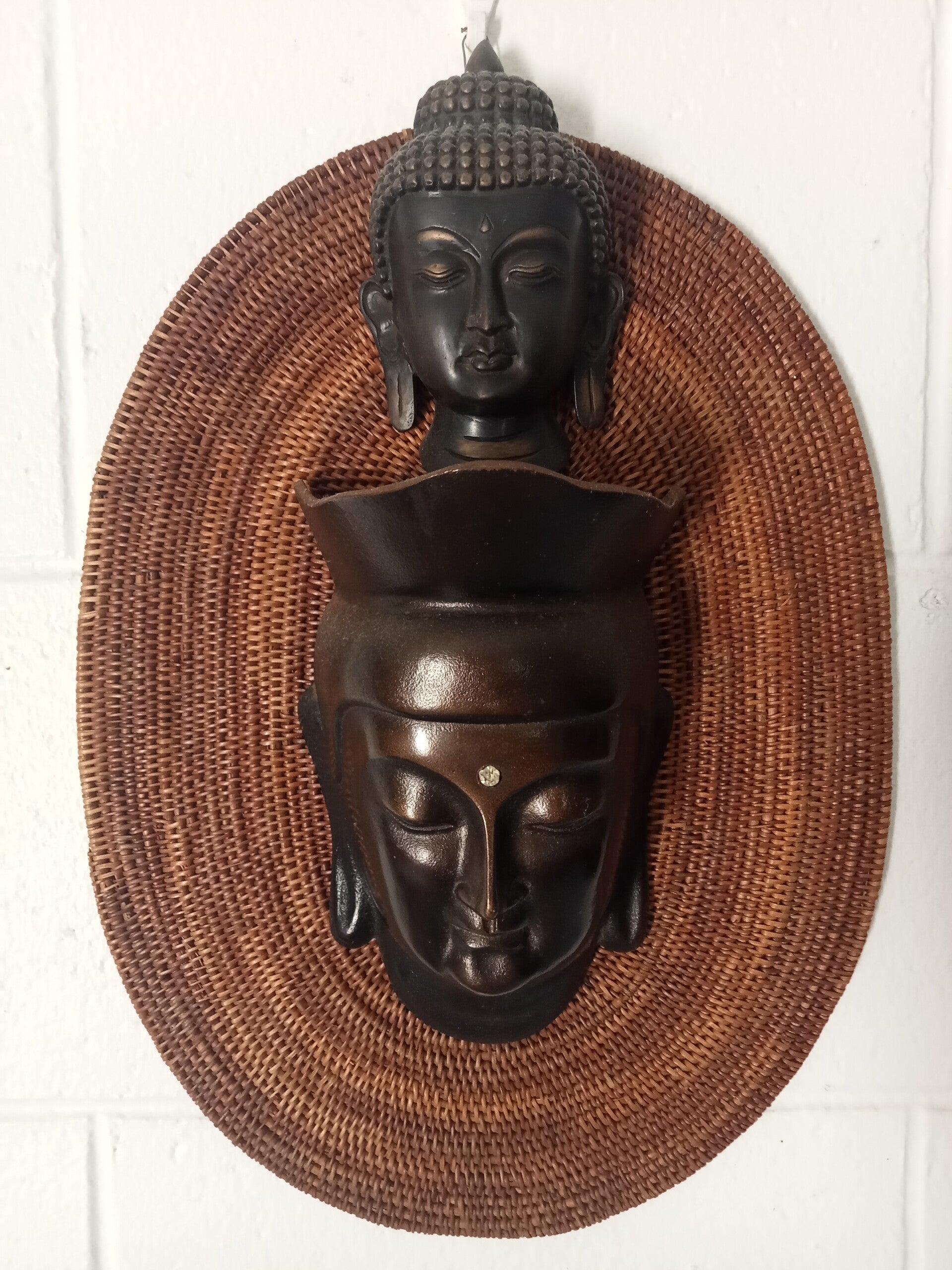 Bronze wall Buddhas