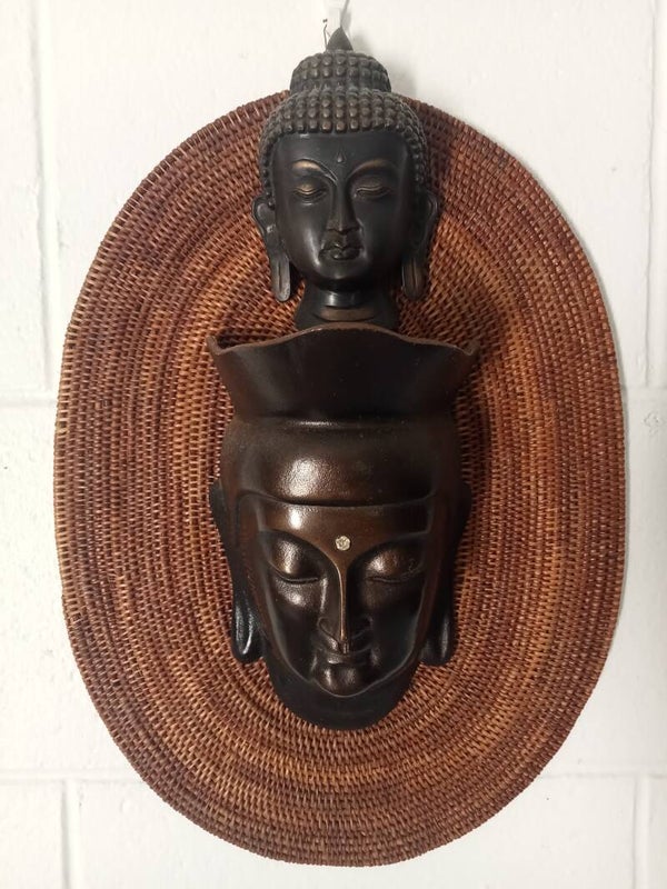 Bronze wall Buddhas