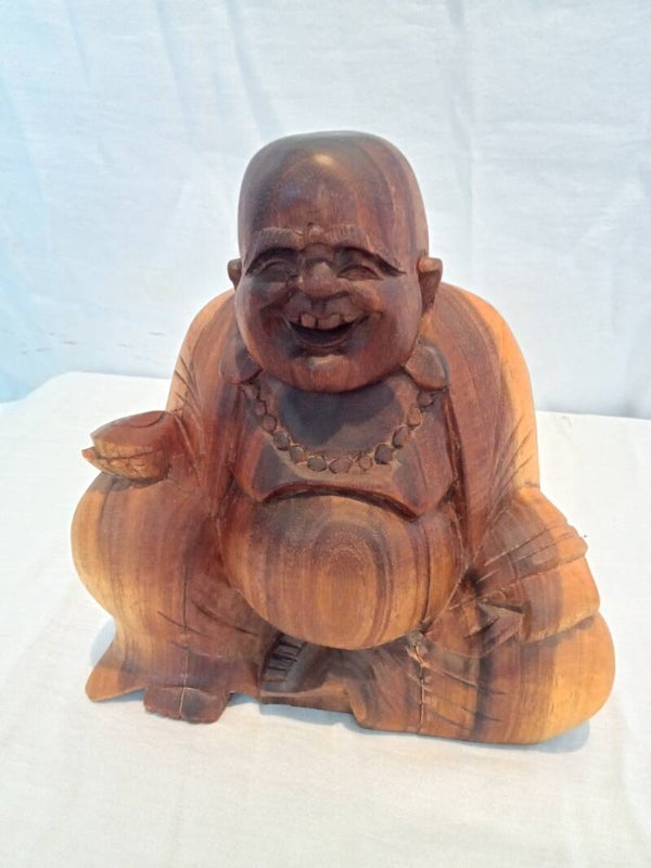 small wooden Buddha