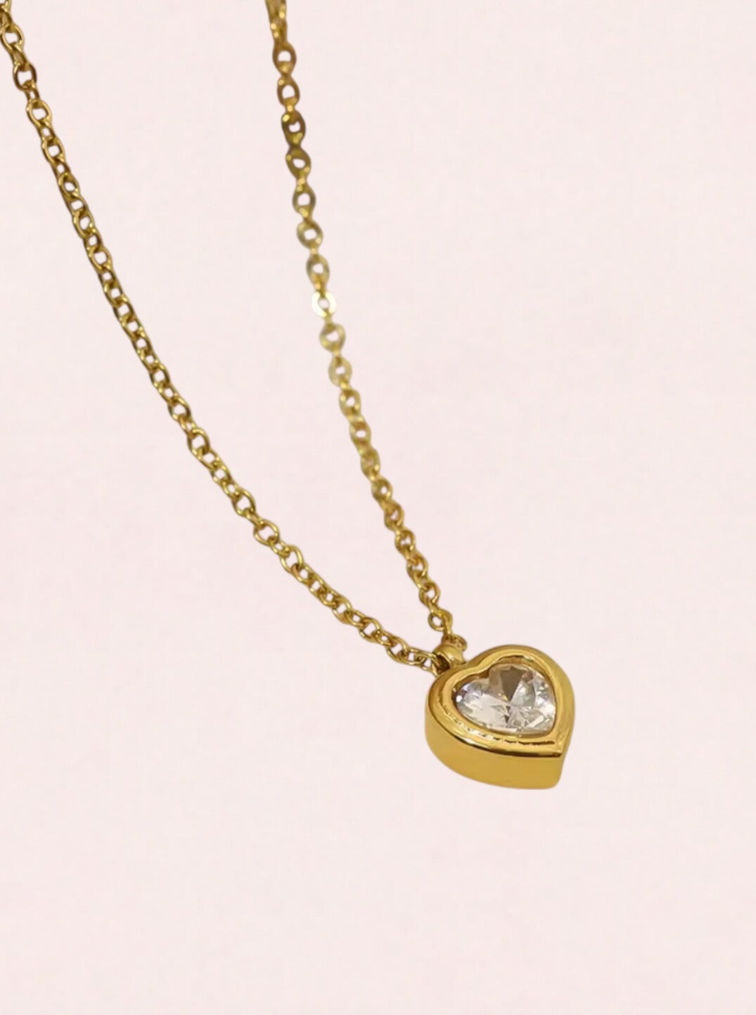 Ketting met hartjes hanger clear goud