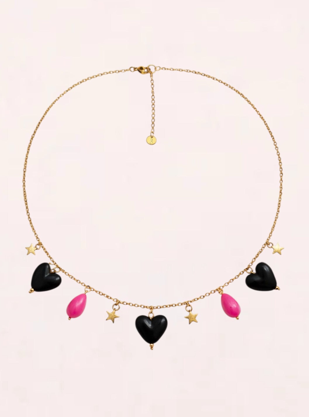 Bedelketting met zwarte hartjes en acryl kralen