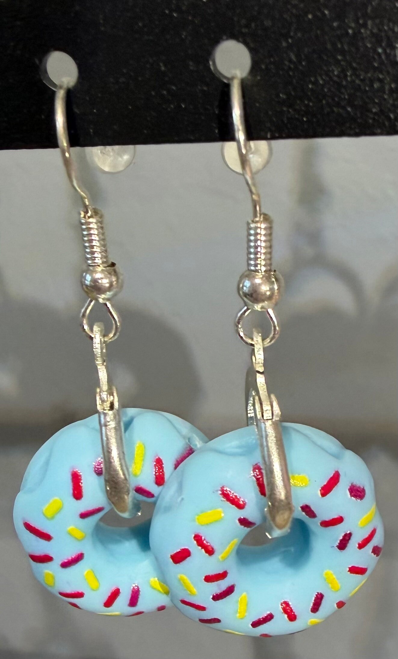 Boucles d’oreilles argentées donuts bleus