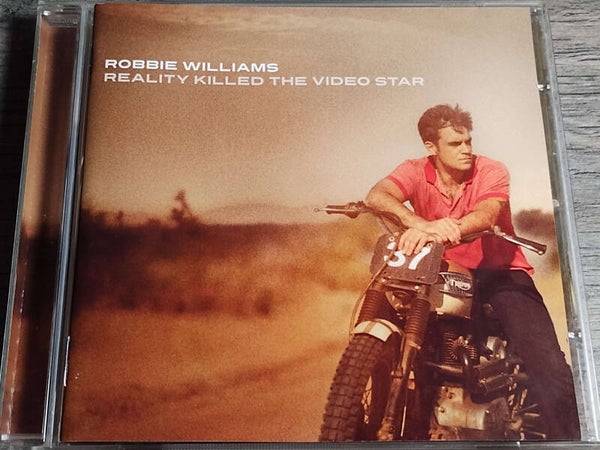 Robbie Williams - Reality Killed The Video Star