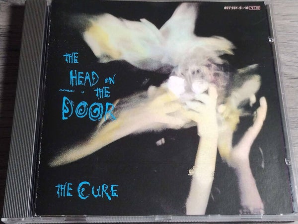 The Cure - The Head On The Door