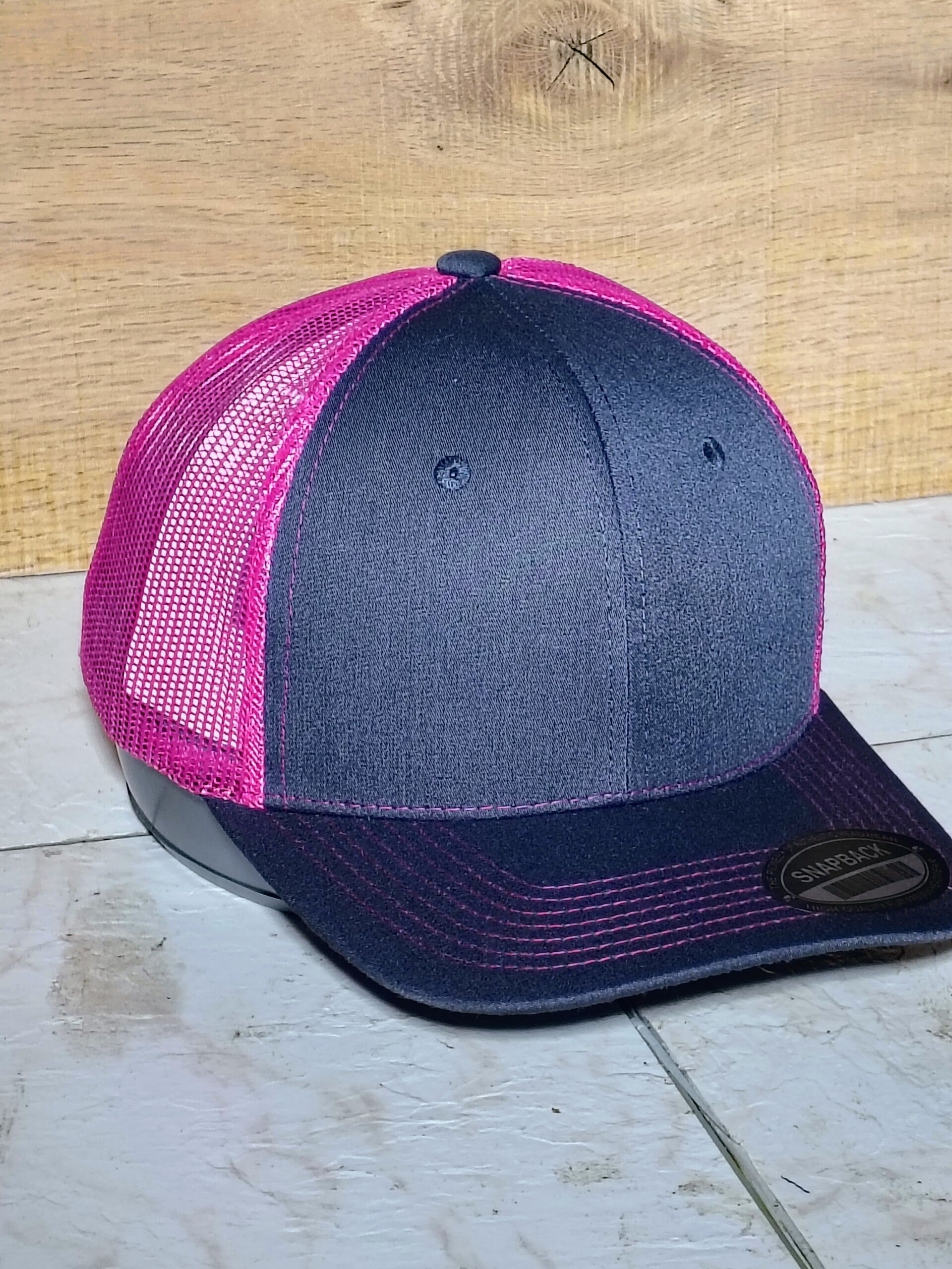 Grey pink trucker