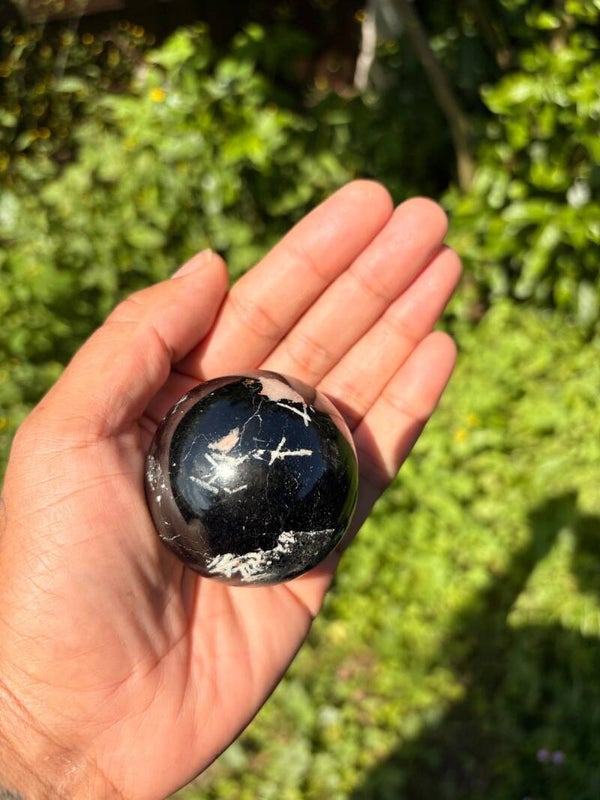 Black tourmaline sphere ball protection 276g comes on small plastic stand