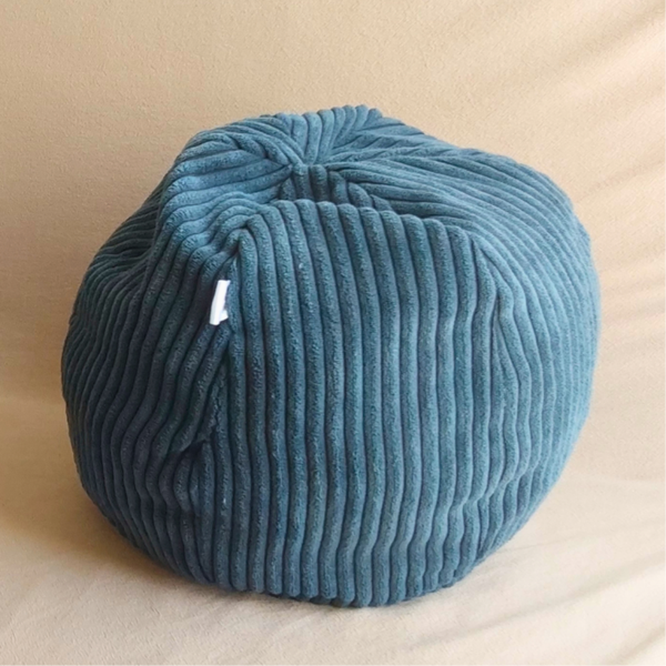 Coussin rond en velours côtelé bleu marine – Polyvalent et plein de douceur -