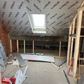 Second layer of insulation being installed 