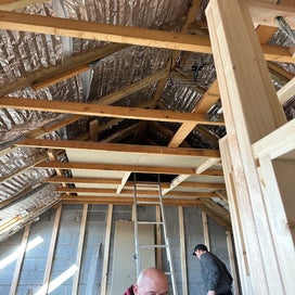 Storage provided in a loft conversion 