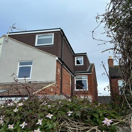 Rear and side dormer, wall hung tiles finish. 