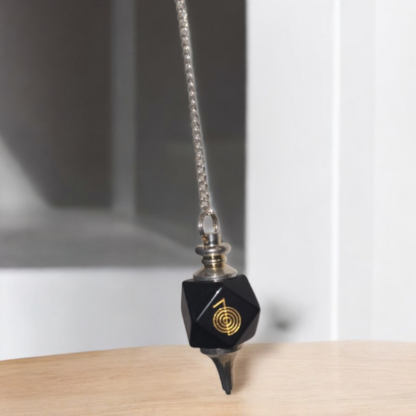 Pendule divinatoire onyx et symbole doré