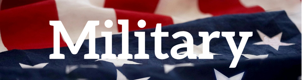 A military flag waving in the wind with the word 'MILITARY' boldly printed across it