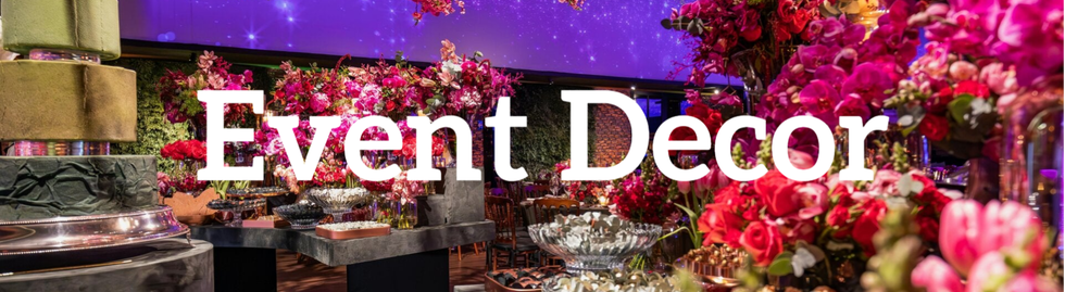 A stylish event setting with punch bowls and fresh flowers, adding a touch of elegance.