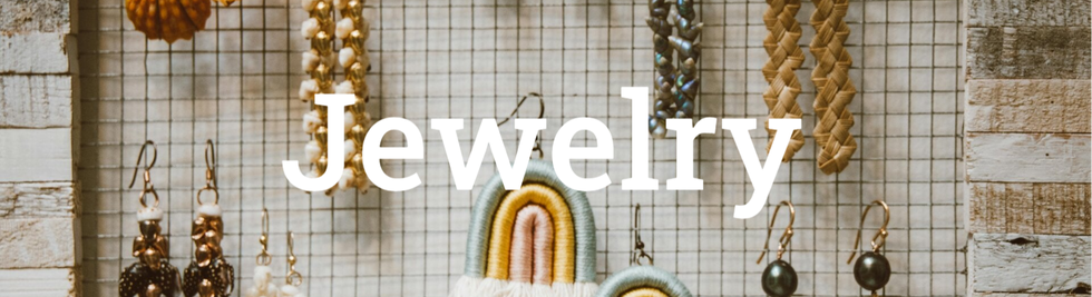 Elegant jewelry pieces beautifully arranged on a hanging display.