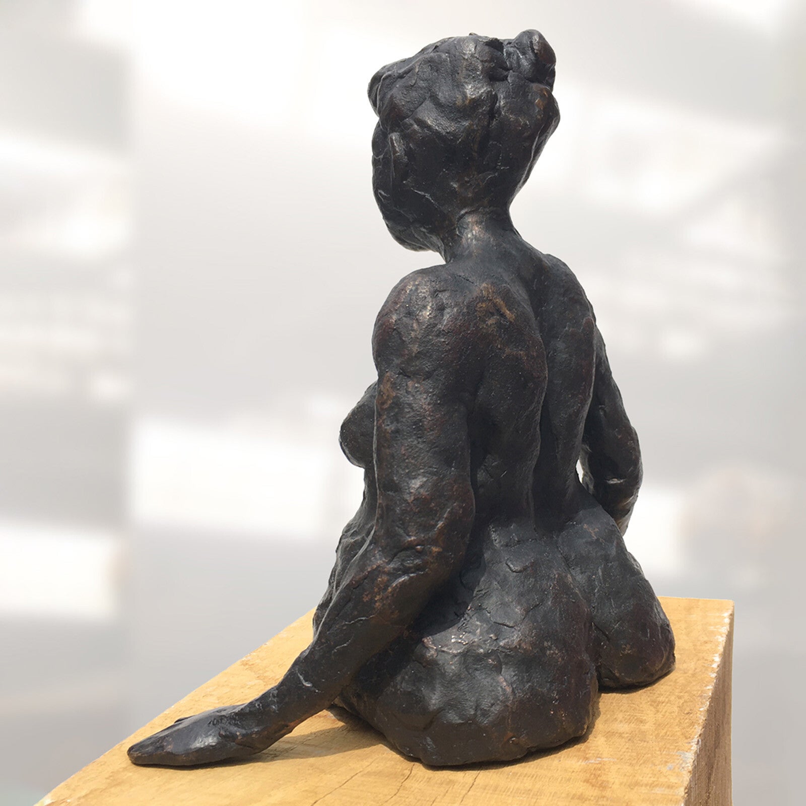 Bronzen beeld De Baadster van Susan Schoemaker