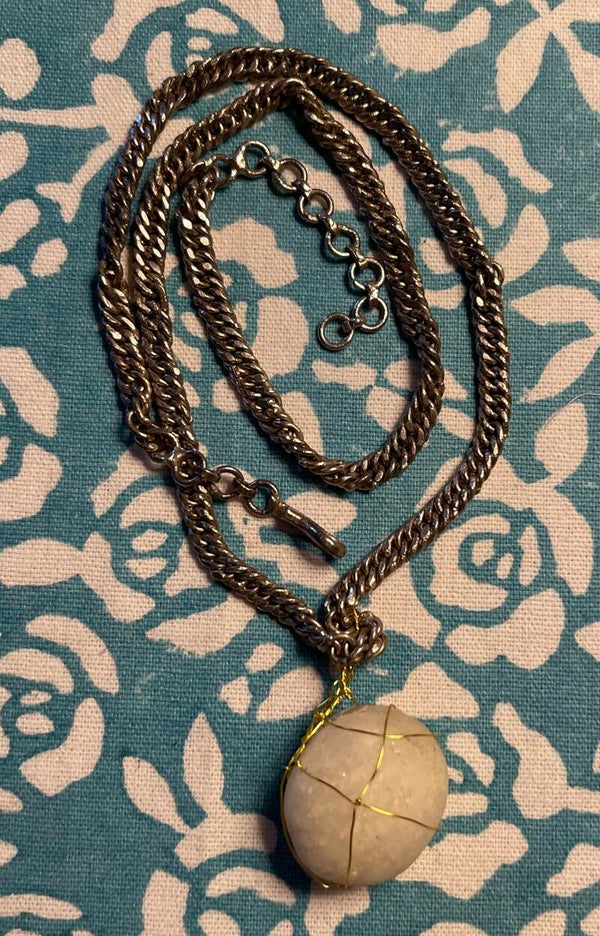 Silver( pure) chain with moon stones pendant.