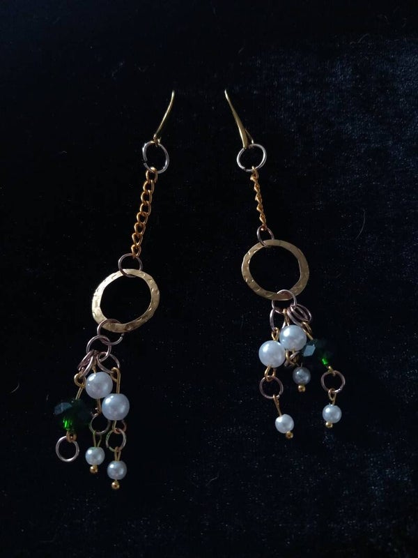 Gold toned and pearl earrings