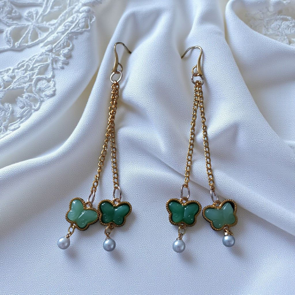 Drop butterfly and pearl earrings