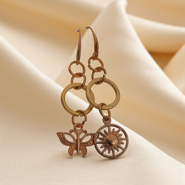 Gold toned mis matched earrings