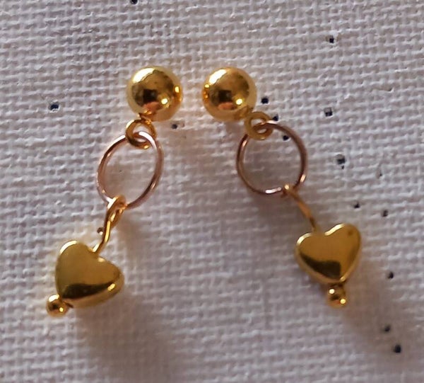 Delicate gold toned earrings