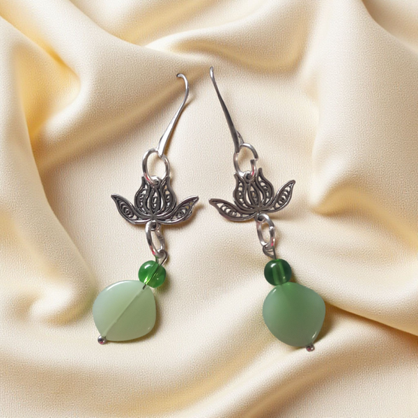 Green beaded silver tone earrings