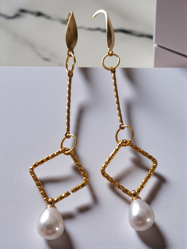 Gold and pearl earrings