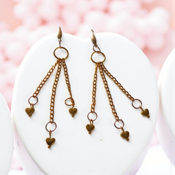 Gold toned heart drop earrings