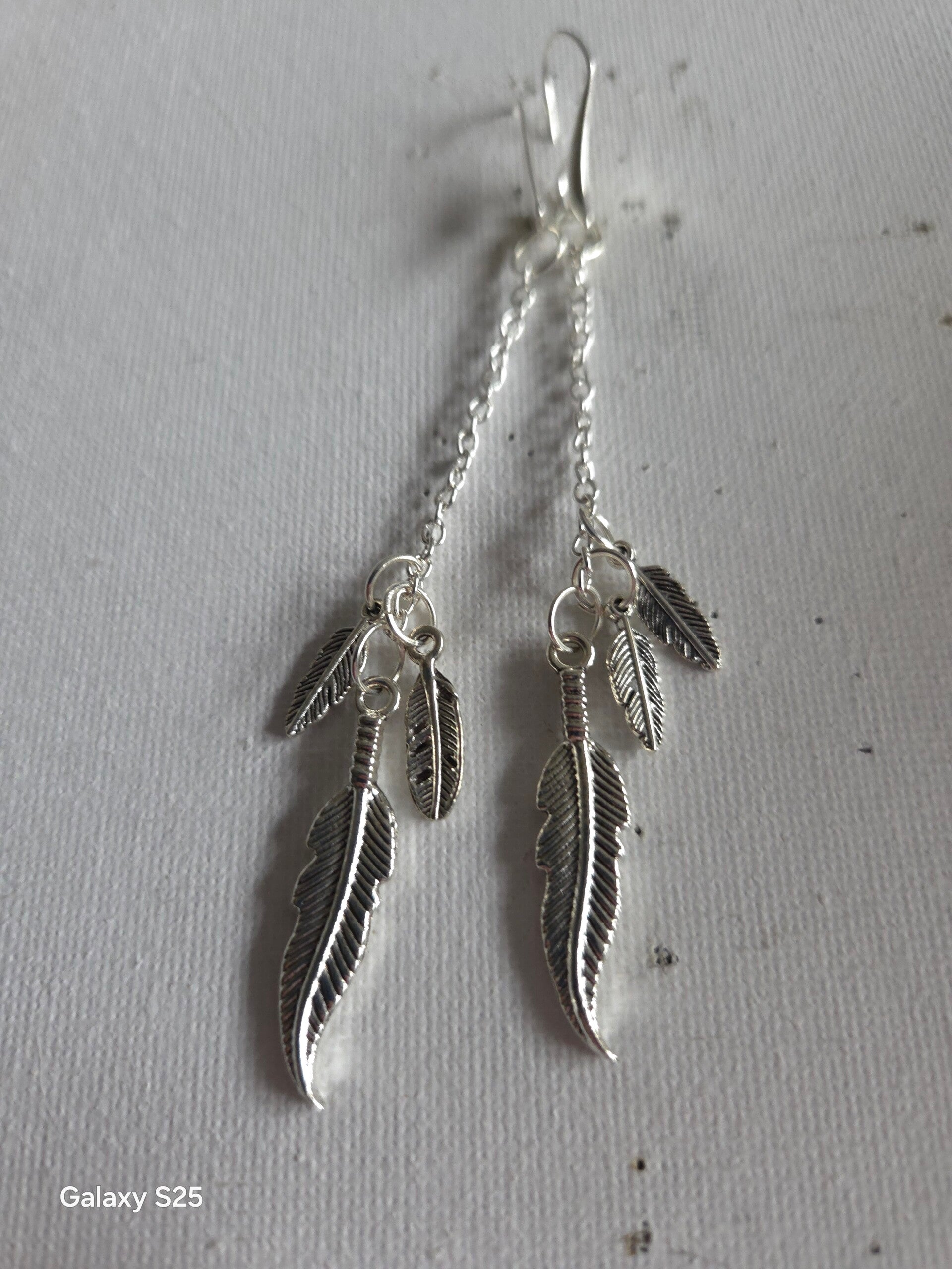 Silver feathered earrings