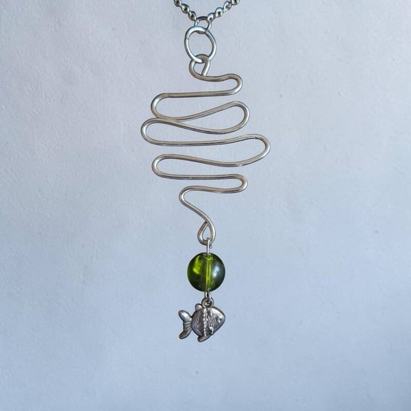 Silver pendant squiggly design