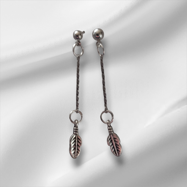 Delicate silver feathered earrings