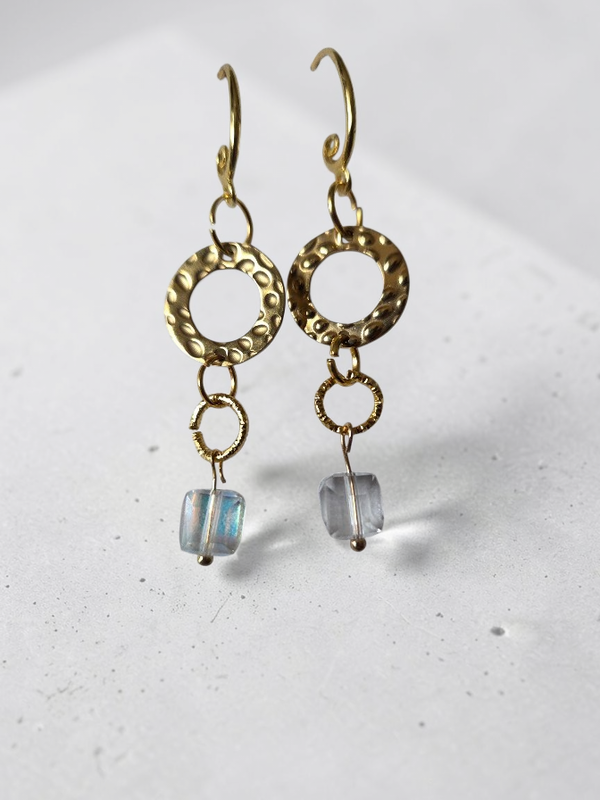 Gold toned earrings with crystal.bead