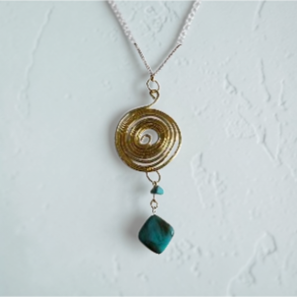 Gold swirl hand crafted pendant