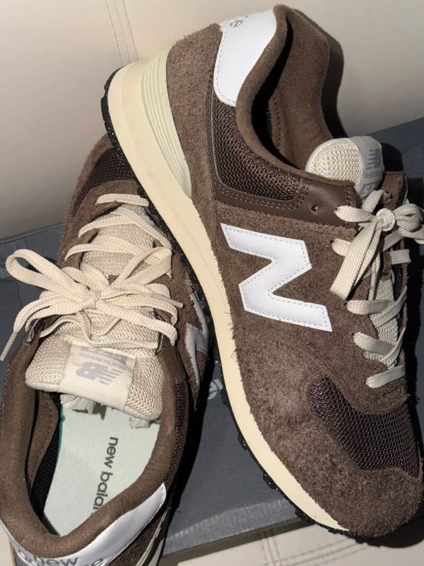 New Balance 574 "Dark Mushroom" sneakers featuring a shaggy brown suede