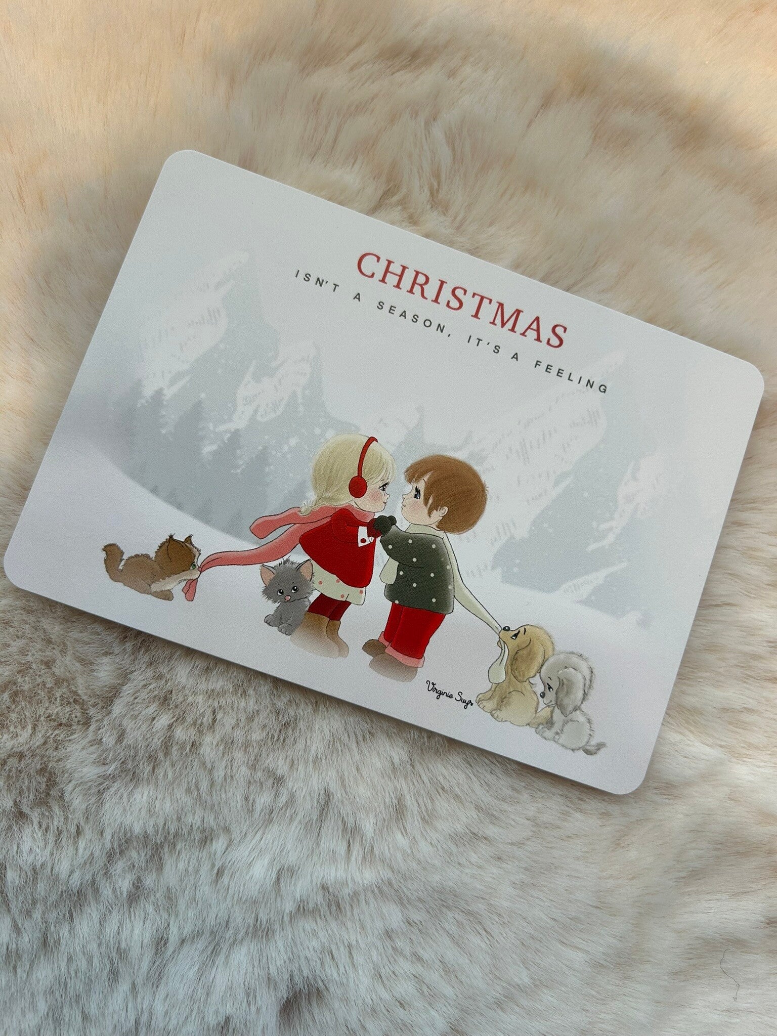 Wenskaart Kerst boy & girl with animal