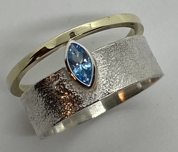 Zilveren ring met geelgouden band