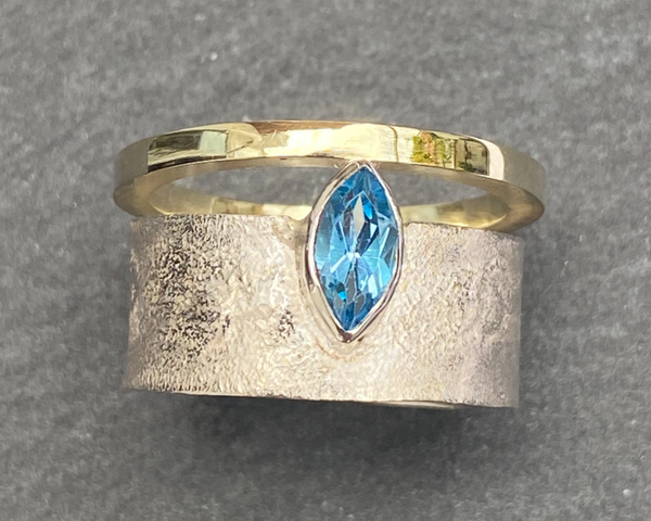 Zilveren ring met gouden band